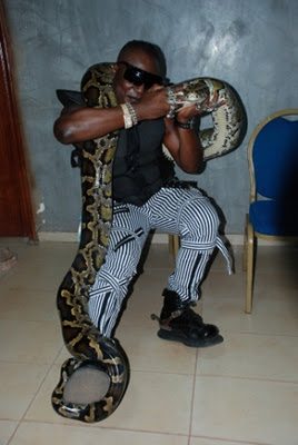 charly boy and his pet python