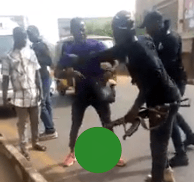 policemen attack yahoo boy enugu